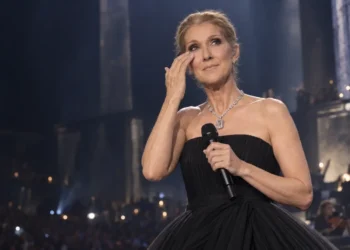 Céline Dion wiping away tears during her September 2026 Paris comeback concert