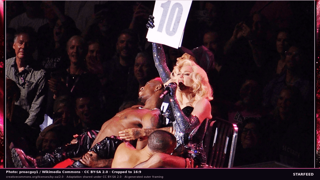 Madonna performing onstage during the Celebration Tour